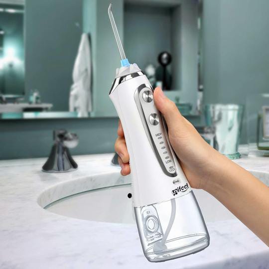 How to clean cordless water flosser reservoir？ | by yang chun | Medium