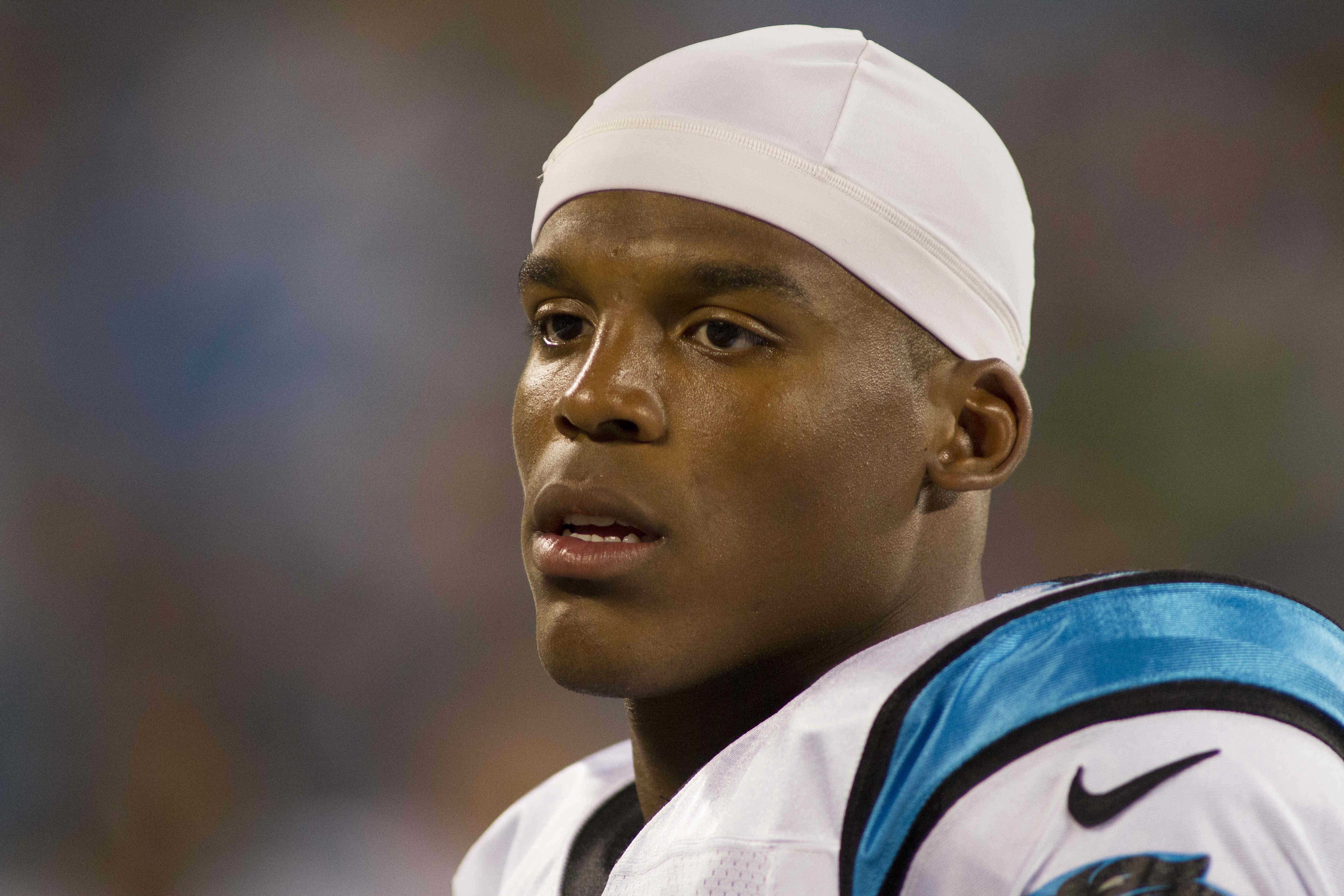 Carolina’s Cam Newton shoots down racial questions during press conference
