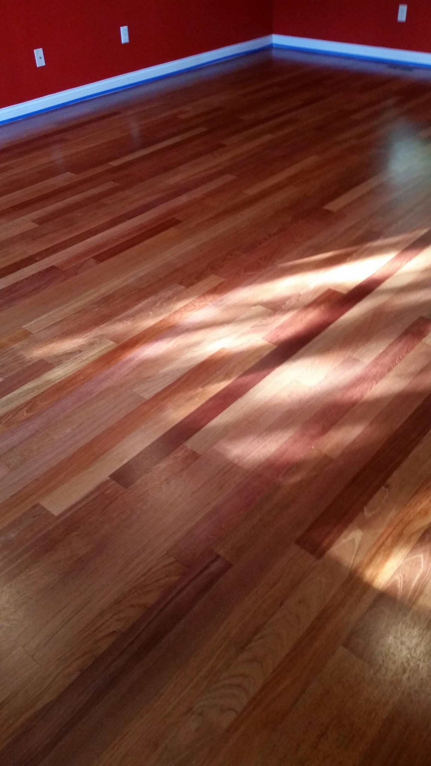 Light Red Refinishing Michigan Hardwood Floors Services, LLC.