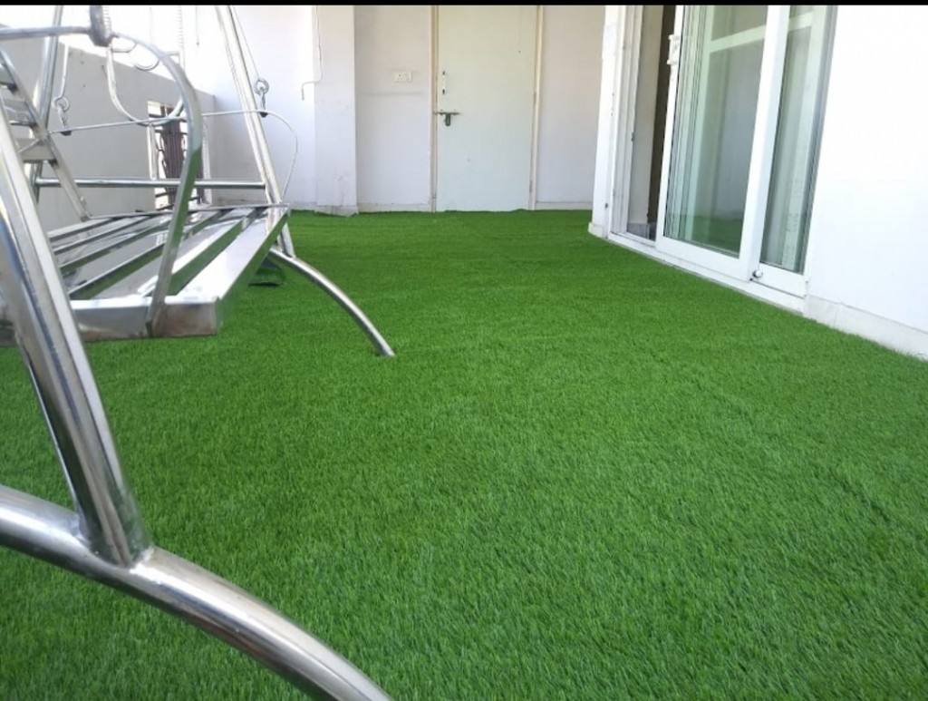 Artificial Grass installation in Delhi MK Bird Nets