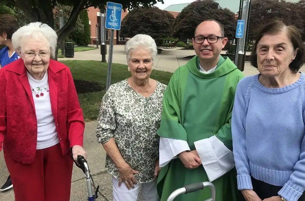 Morning Pointe Residents Attend Mass at Holy Family Catholic Church