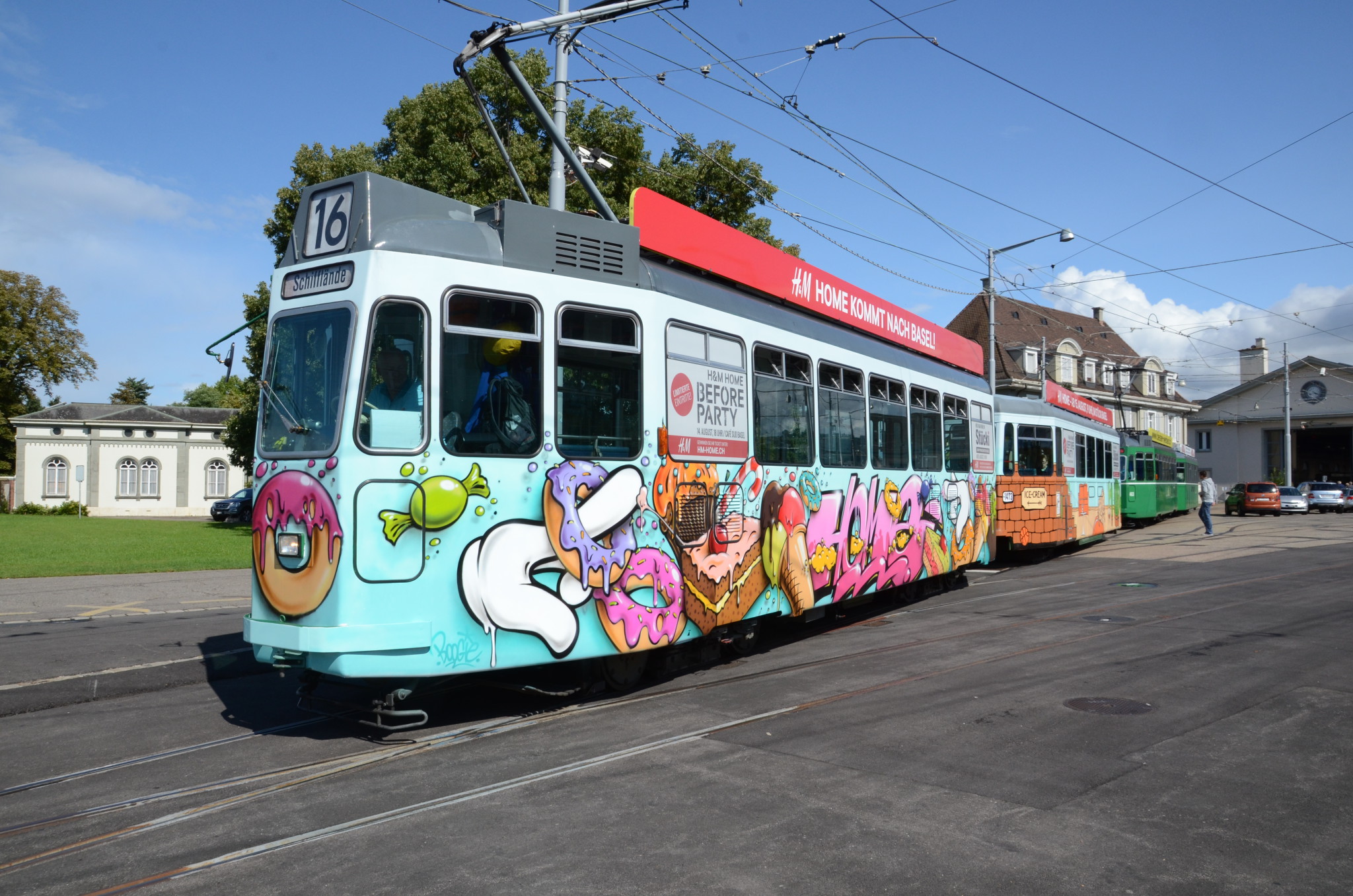 Graffiti tram with H&M Home Moving Media Basel AG