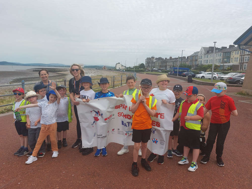 Schoolboy delighted to hand Games relay baton to Morecambe lifeboat