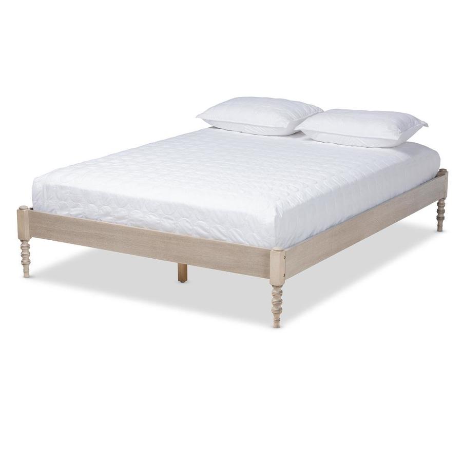 The tall, tufted upholstered headboard stands out in a room. lowe s