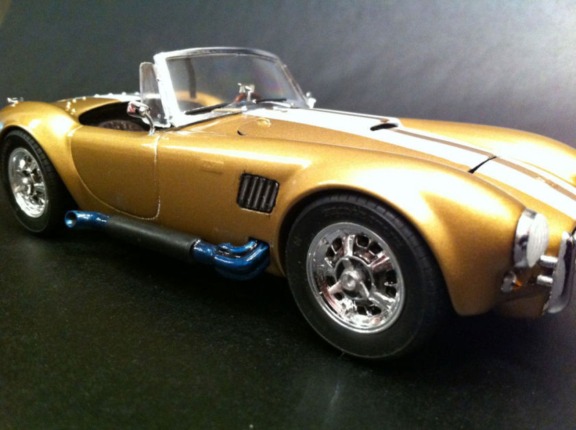 This is a car model AC Cobra assembled from Modelist kit for adults