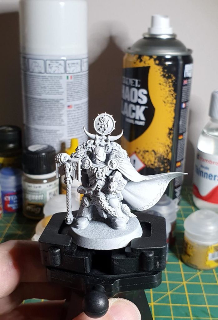 Can acrylic paint go on enamel primer