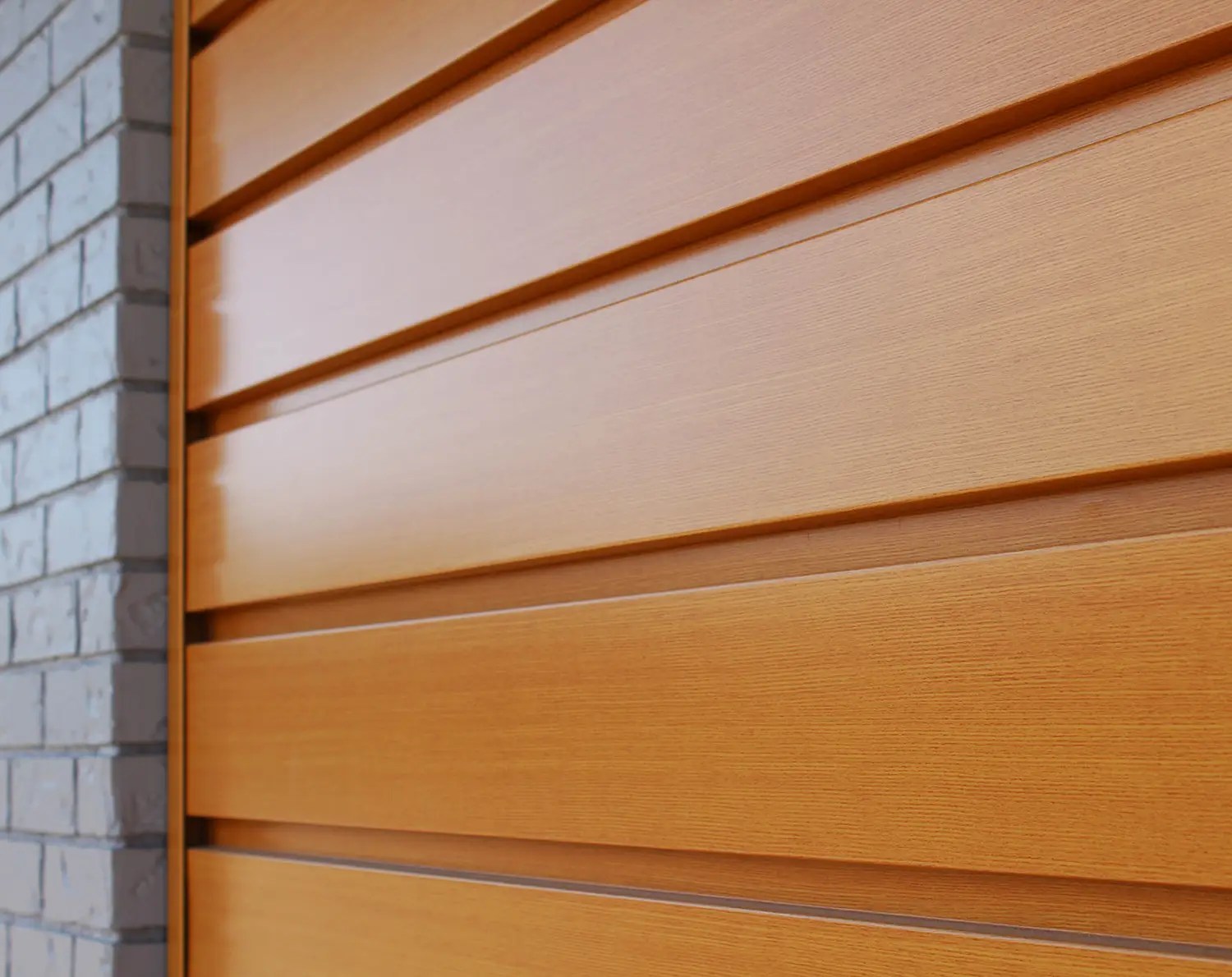 Advantages of Faux Woodgrain Metal Siding Modern Materials