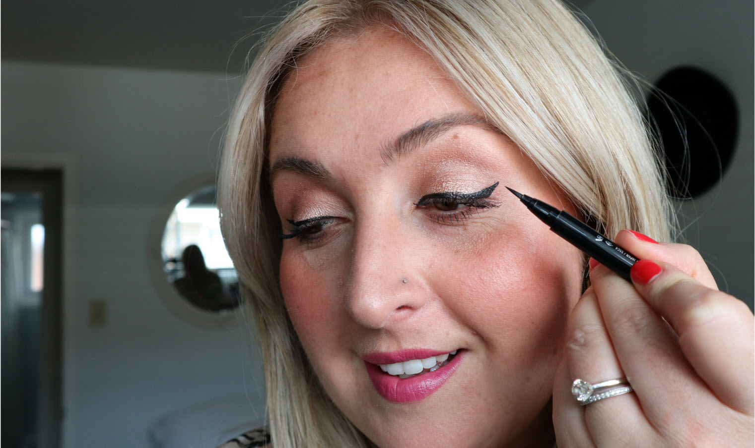 VIDEO Winged liquid eyeliner tutorial for downturned eyes using MAC