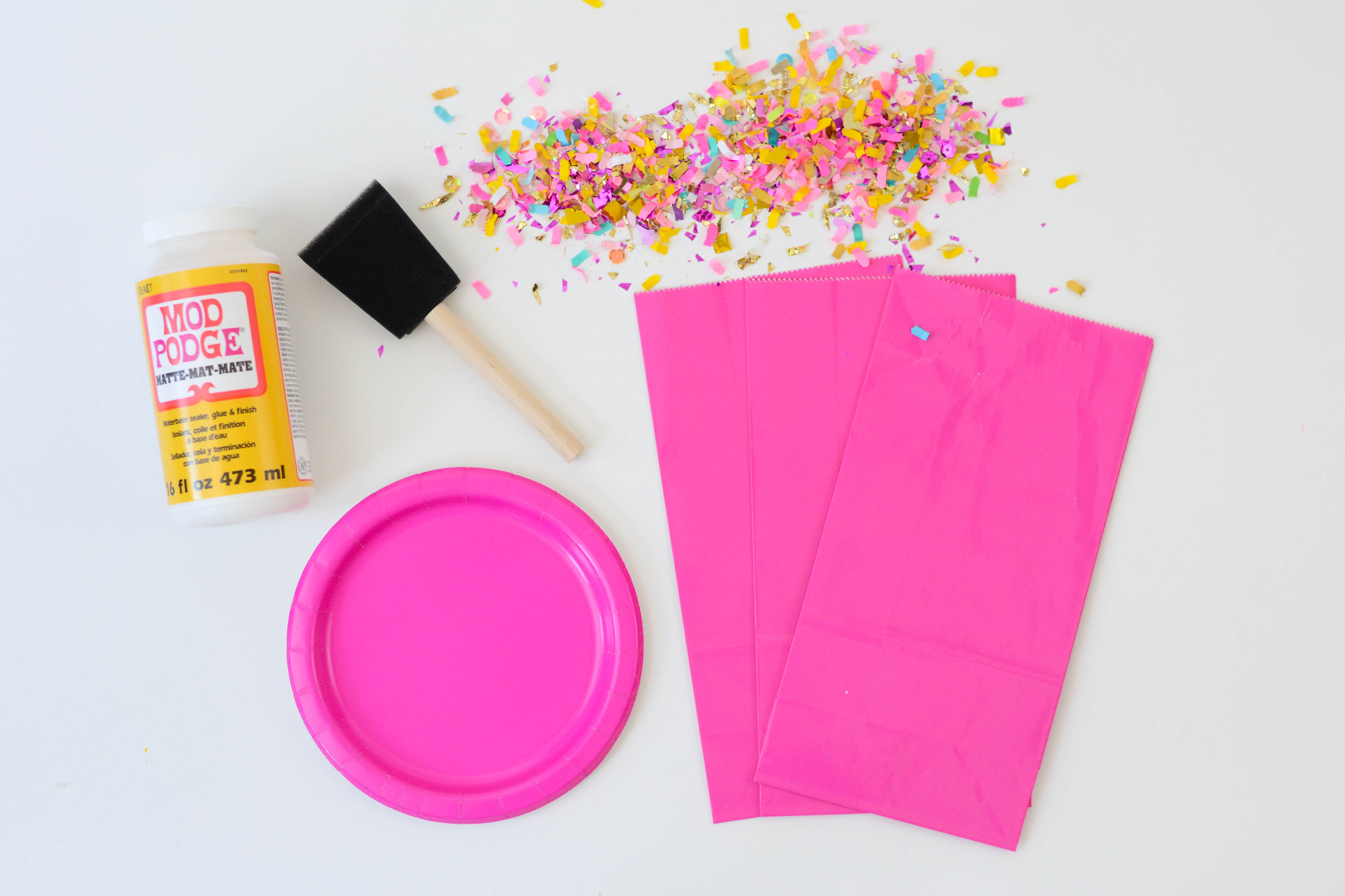 Confetti dipped DIY goodie bags Mod Podge Rocks