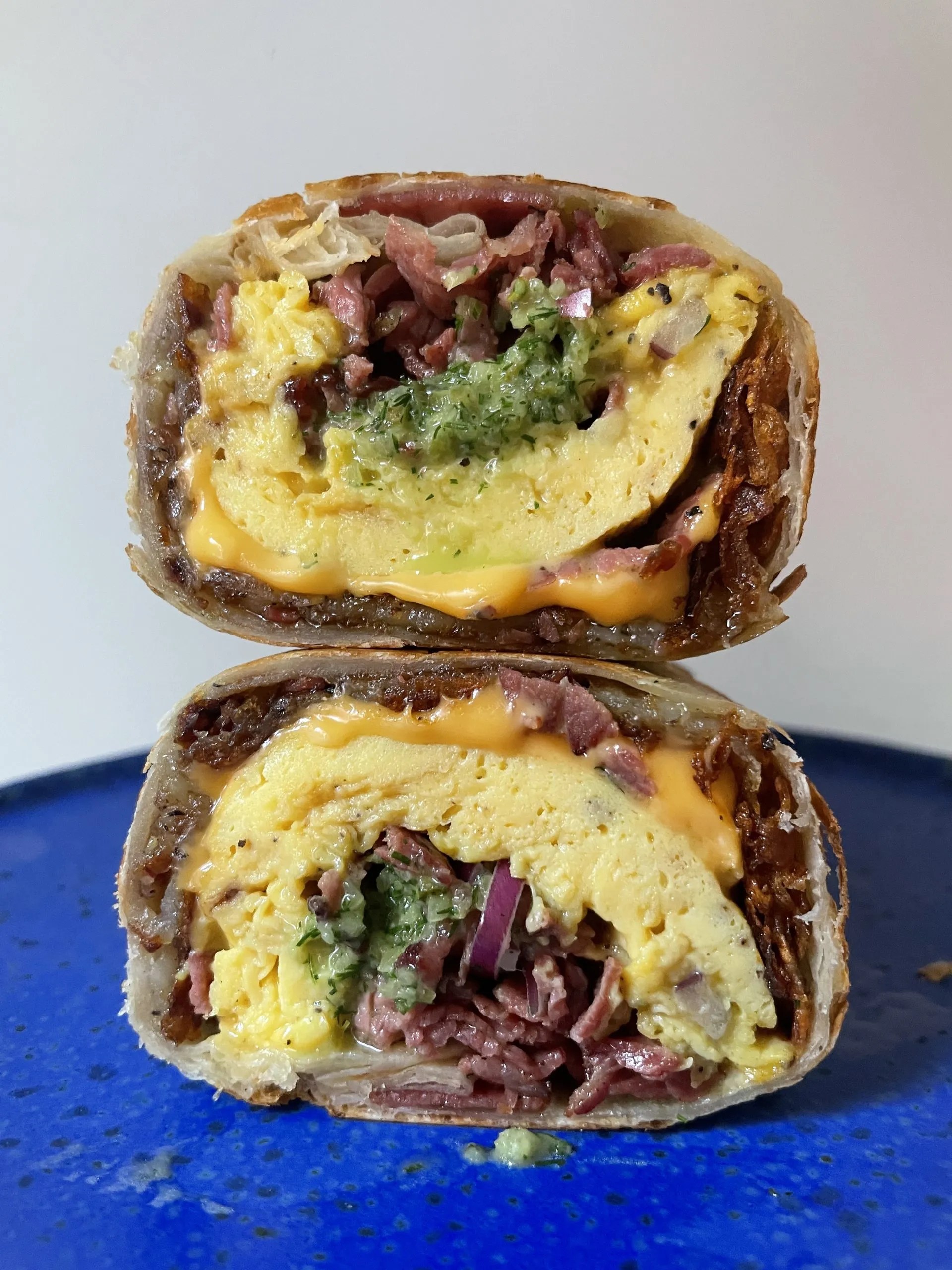 Pastrami Egg and Cheese Burrito with Dill Pickle Salsa Molly Baz