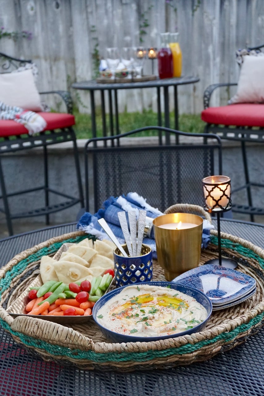 A Festive Blue And Rustic Setting For Small Outdoor Gathering