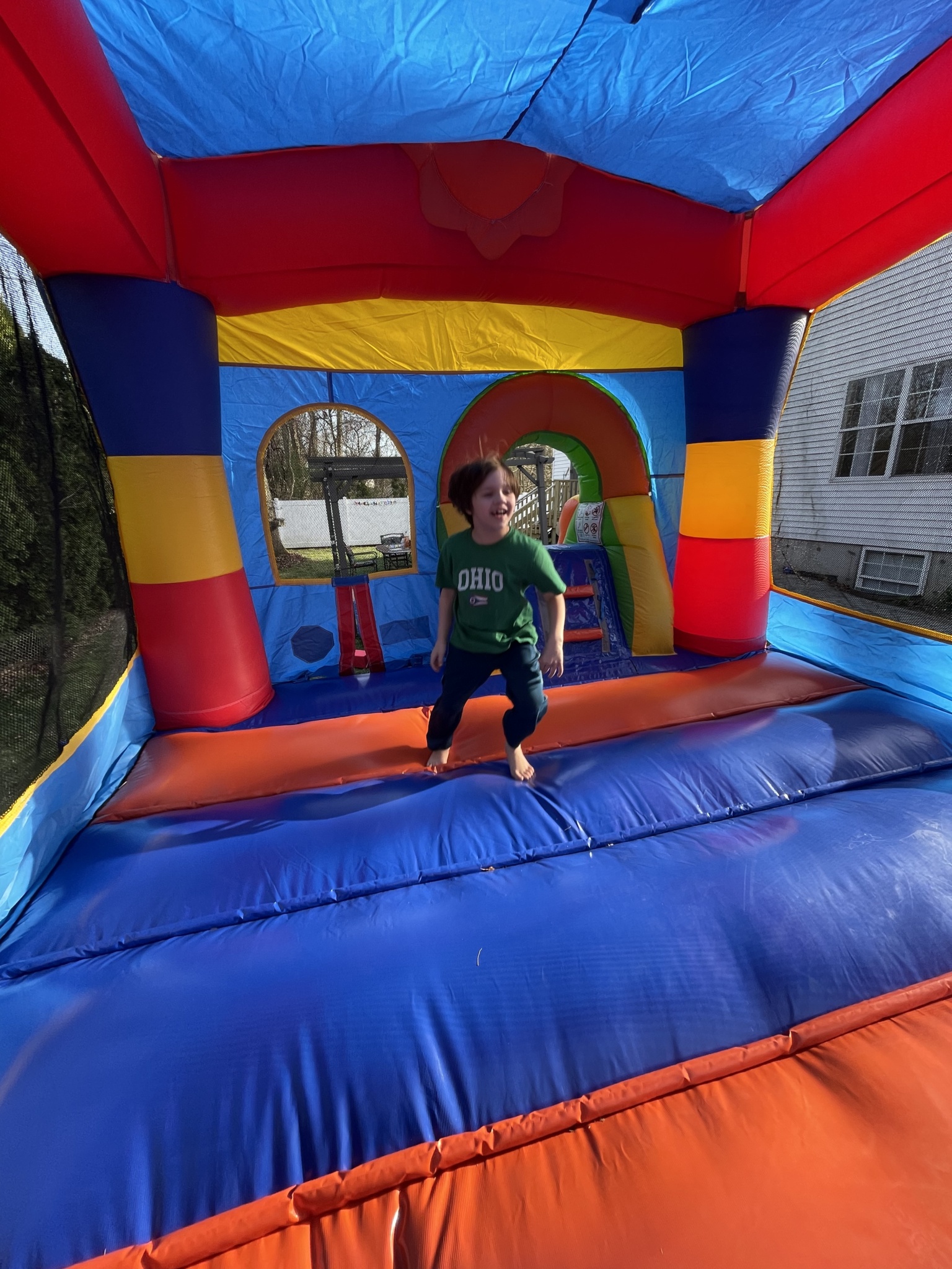 Rainbow Castle Smiley Face Bounce House Slide Combo Review Mommy's Bundle