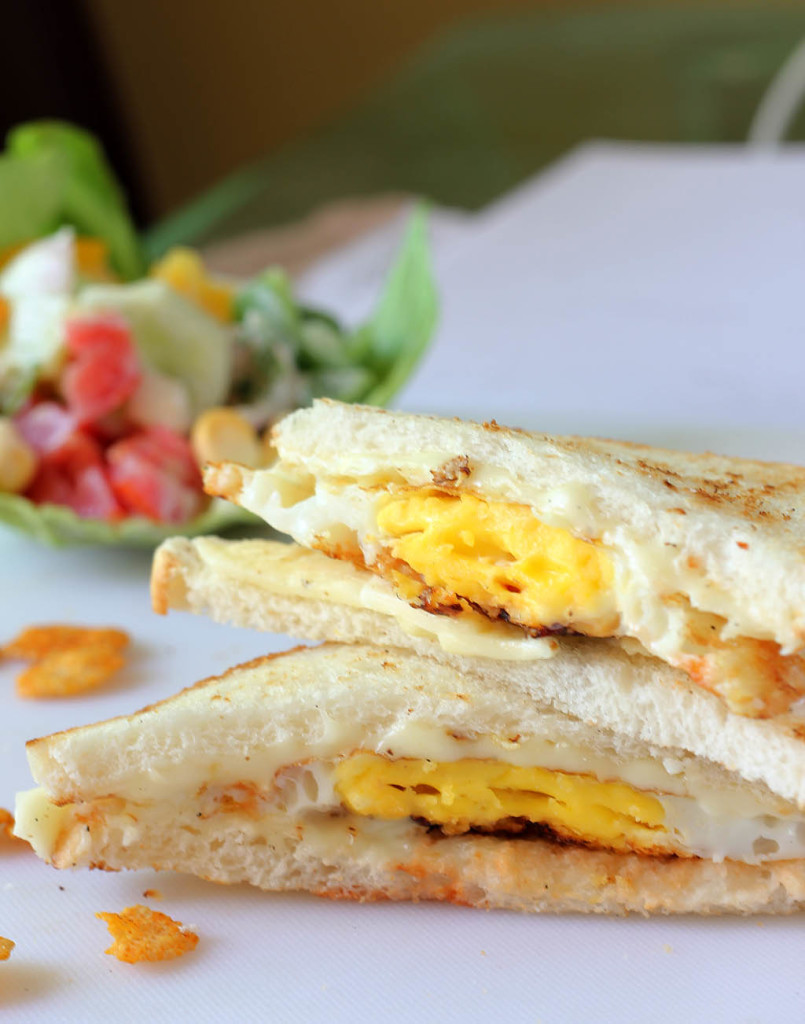 Monica's Indian Express Fried Egg, Cheese and Chili Sauce sandwich