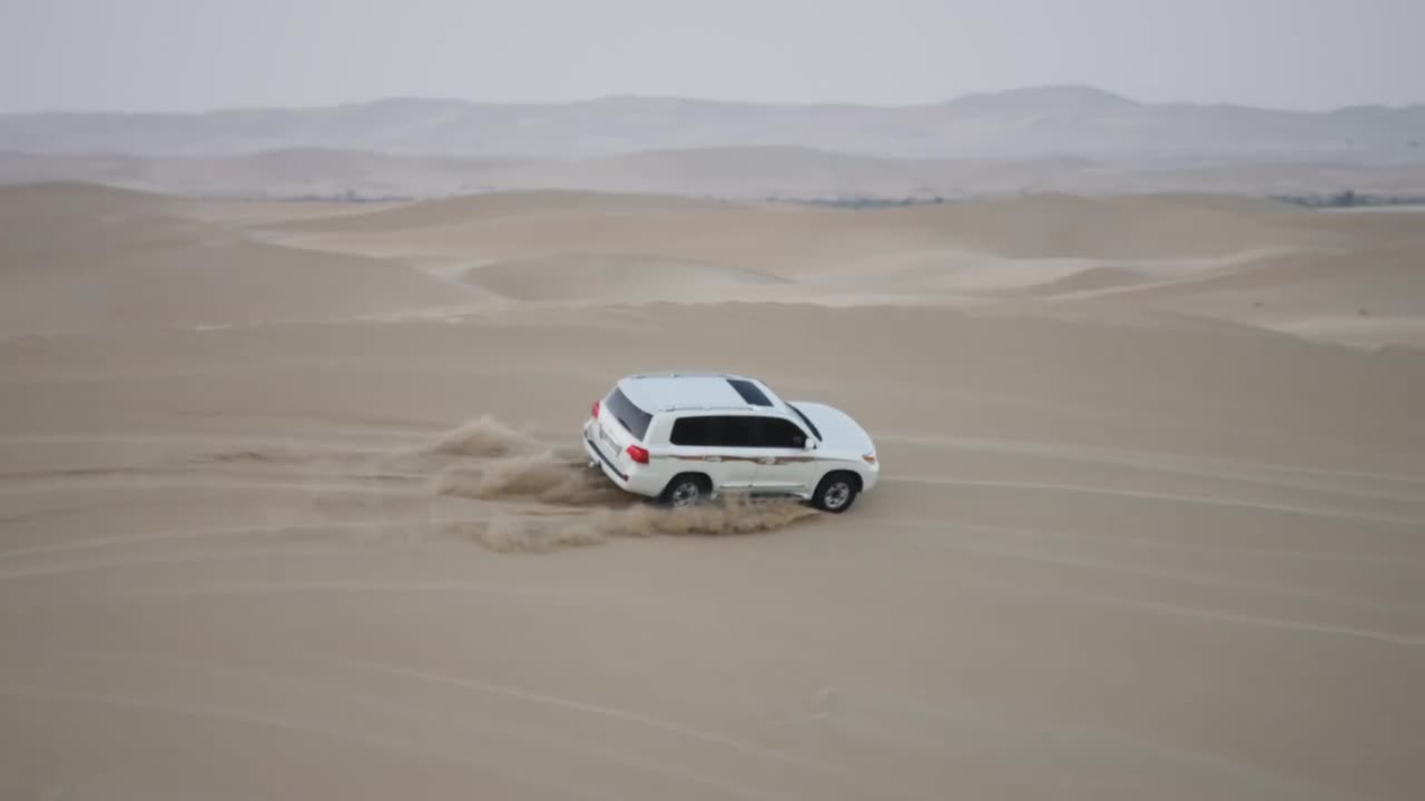 White Car Driving On Sand Dunes Stock Video Motion Array