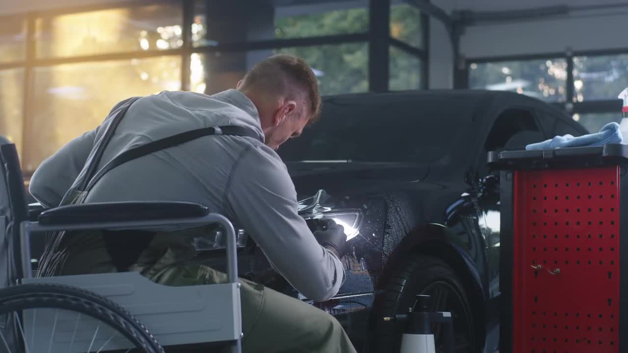 Mechanic In A Wheelchair Stock Video Motion Array