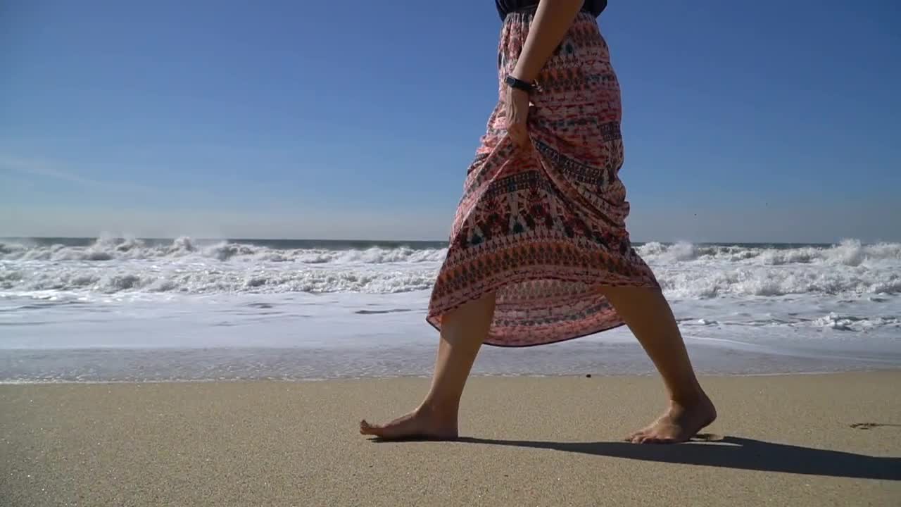 Girl Walking On The Beach Stock Video Motion Array