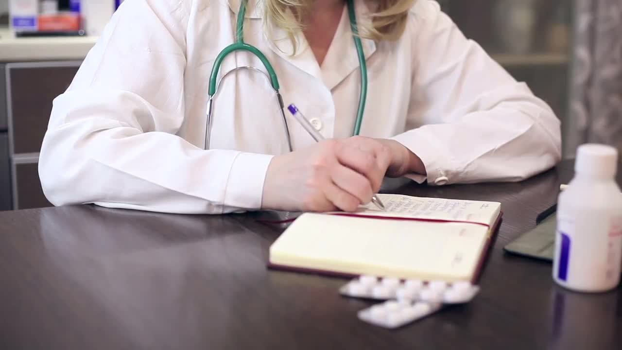 Doctor Prescribes Medicine Stock Video Motion Array