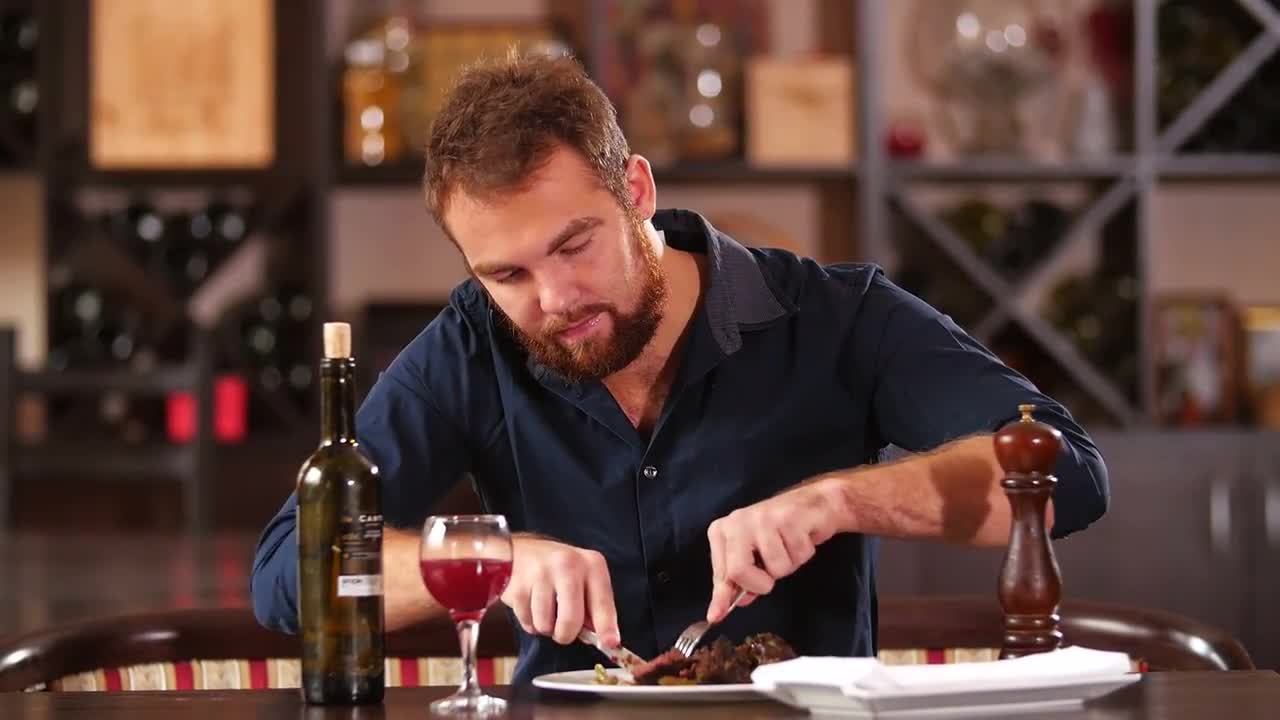 Man Eating Steak Stock Video Motion Array