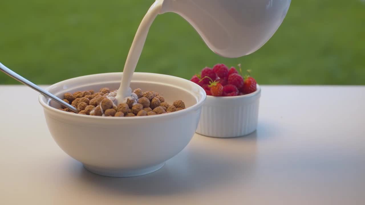 Milk On Cereal Stock Video Motion Array