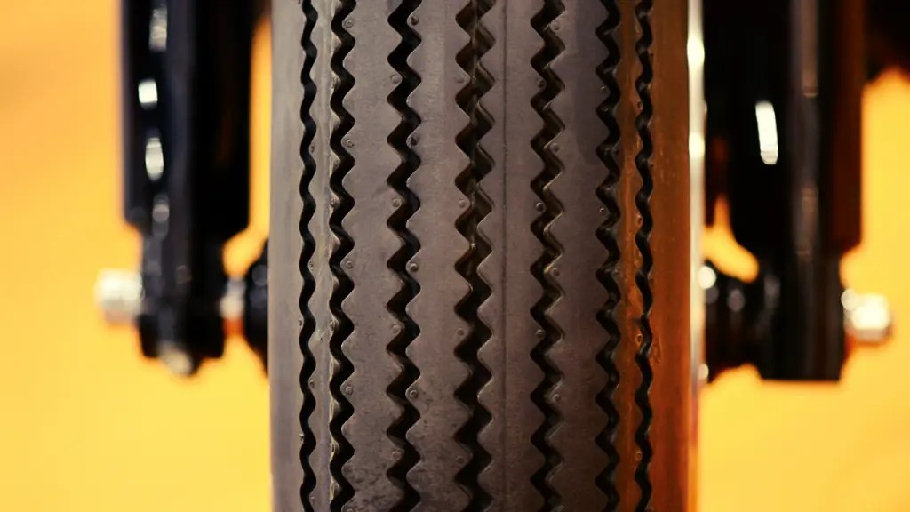 What causes motorcycle tire cupping?