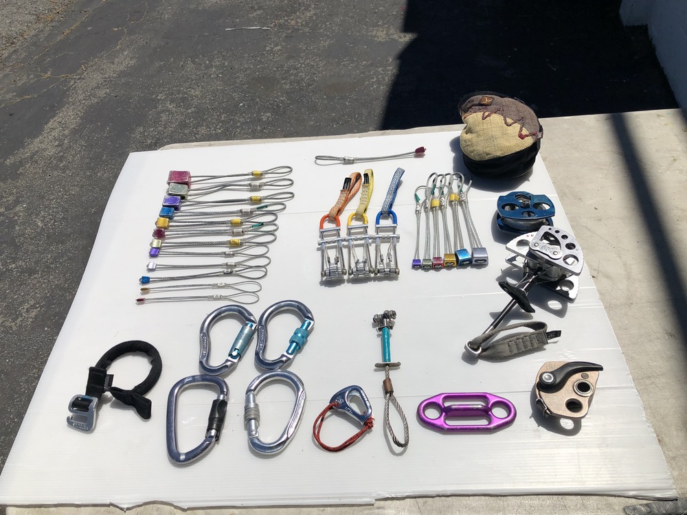 lots of climbing gear for sale trad rack, nut sets, harnesses, approach and climbing shoes