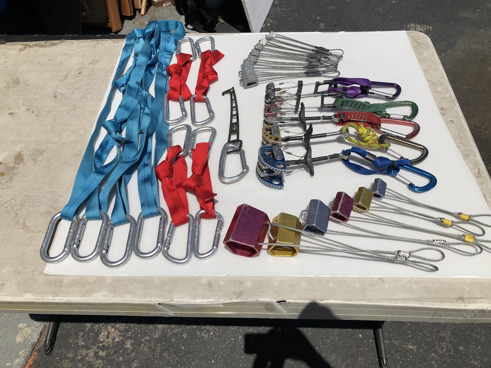 lots of climbing gear for sale trad rack, nut sets, harnesses, approach and climbing shoes