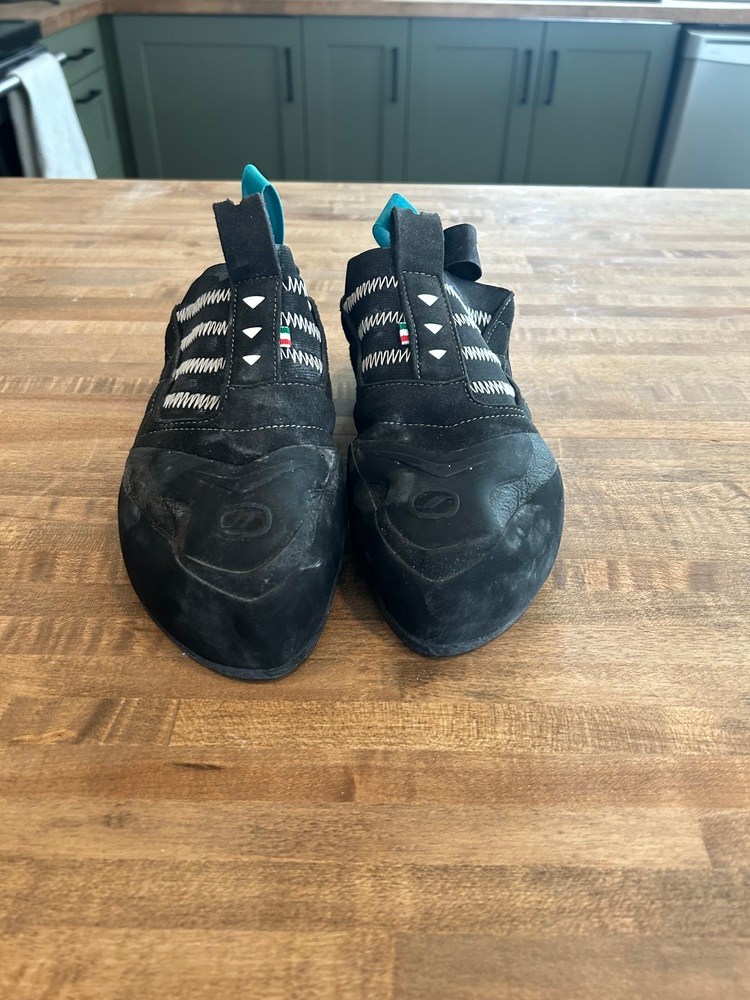 Pile of Scarpa Shoes for sale