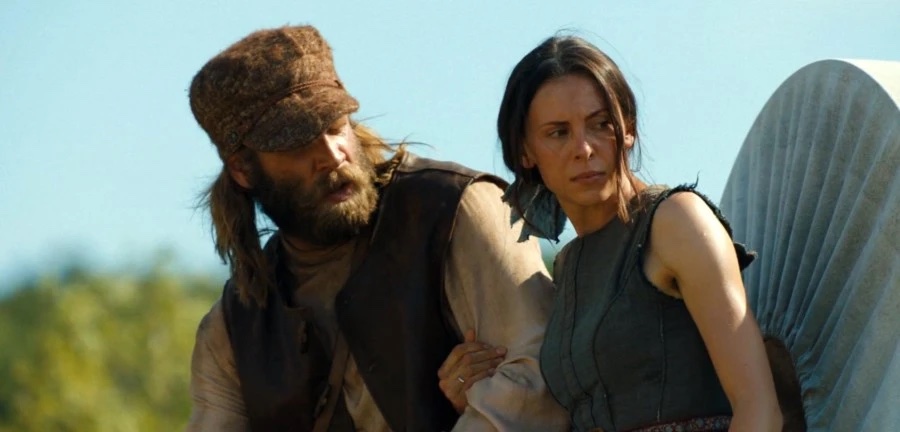 Marc Rissmann as Josef and Anna Fiamora as Risa in a scene from the Paramount+ original series 1883, Created and written by Taylor Sheridan. Photo Cr: Paramount+ © 2022 MTV Entertainment Studios. All Rights Reserved.
