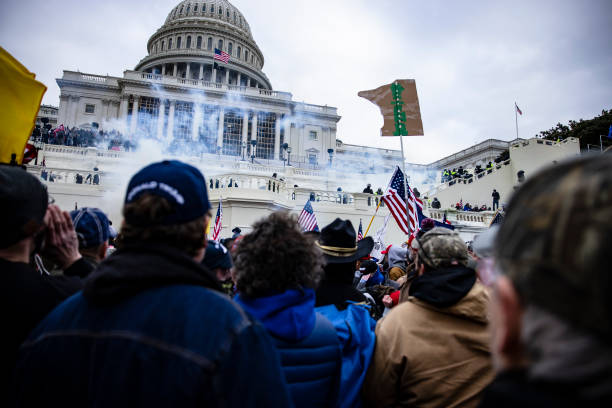 Pro-Trump supporters storm the U.S. Capitol following a rally with President Donald Trump on January 6, 2021 in Washington, DC. Trump supporters gathered in the nation's capital today to protest the ratification of President-elect Joe Biden's Electoral College victory over President Trump in the 2020 election. (Photo by Samuel Corum/Getty Images)