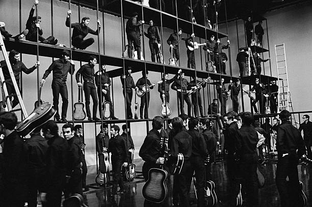 ELVIS: '68 COMEBACK SPECIAL -- Pictured: "Guitar Man" extras Elvis Presley during the Elvis '68 Comeback Special on NBC -- (Photo by: Frank Carroll/Gary Null/NBCU Photo Bank/NBCUniversal via Getty Images via Getty Images)