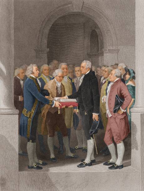 30th April 1789:  The inauguration of George Washington as the first President of the United States, at the Federal Hall in New York City. Robert Livingston (left), Chancellor of New York State administers the oath of office. Also present (from left to right) are Arthur St Clair, Samuel A Otis, General Henry Knox, Roger Sherman, (Washington), Baron Friedrich von Steuben and John Adams.  (Photo by Stock Montage/Stock Montage/Getty Images)