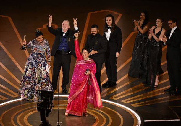 Indian filmmaker Kartiki Gonsalves (L) and Indian film producer Guneet Monga (R) accept the Oscar for Best Short Subject Documentary for "The Elephant Whisperers" onstage during the 95th Annual Academy Awards at the Dolby Theatre in Hollywood, California on March 12, 2023.
Photo Credit: Patrick T. Fallon/AFP via Getty Images