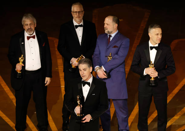 (L-R) Mark Weingarten, Mark Taylor, Al Nelson, James Mather and Chris Burdon accept the Best Sound award for "Top Gun: Maverick" onstage during the 95th Annual Academy Awards at Dolby Theatre on March 12, 2023 in Hollywood, California.
Photo Credit: Kevin Winter/Getty Images