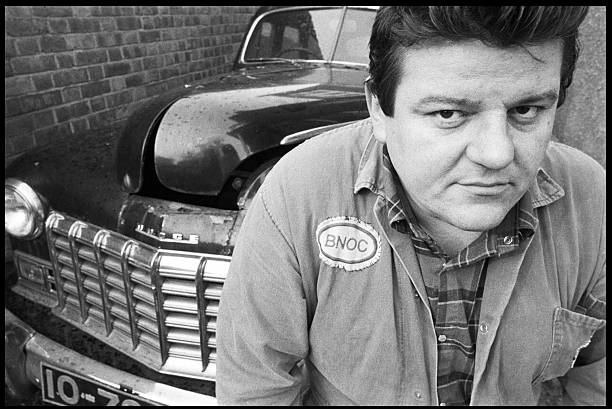 Actor Robbie Coltrane at his home in Kilburn with his Dodge car, London, February 1984. Photo Credit: David Corio/Redferns