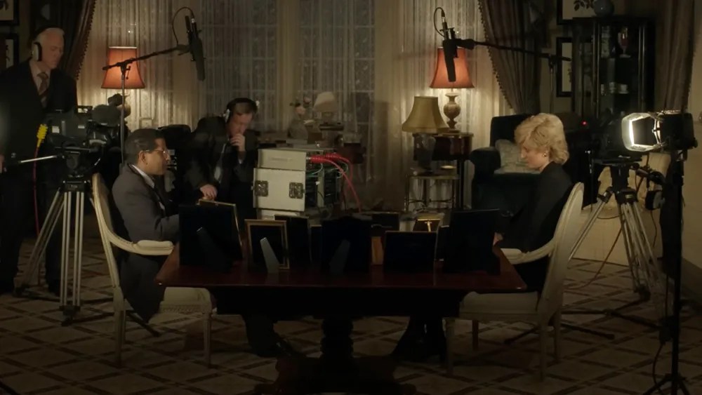 (L to R) Prasanna Puwaharajah, and Elizabeth Debicki in a scene from the television series, "The Crown". Photo Credit: Netflix