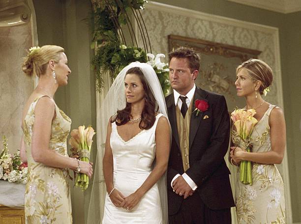 FRIENDS -- "The One With Monica And Chandler's Wedding" -- Episode 24 -- Aired 5/17/2001 -- Pictured: (l-r) Lisa Kudrow as Phoebe Buffay, Courteney Cox as Monica Geller-Bing, Matthew Perry as Chandler Bing, Jennifer Aniston as Rachel Green Photo Credit:: Danny Feld/NBCU Photo Bank