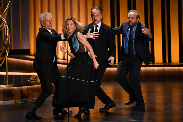 (From L) US actor Greg Germann, US actress Calista Flockhart, Canadian actor Gil Bellows and US actor Peter McNicol perform a sketch onstage during the 75th Emmy Awards at the Peacock Theatre at L.A. Live in Los Angeles on January 15, 2024. Photo Credit: Valerie Macon/AFP via Getty Images
