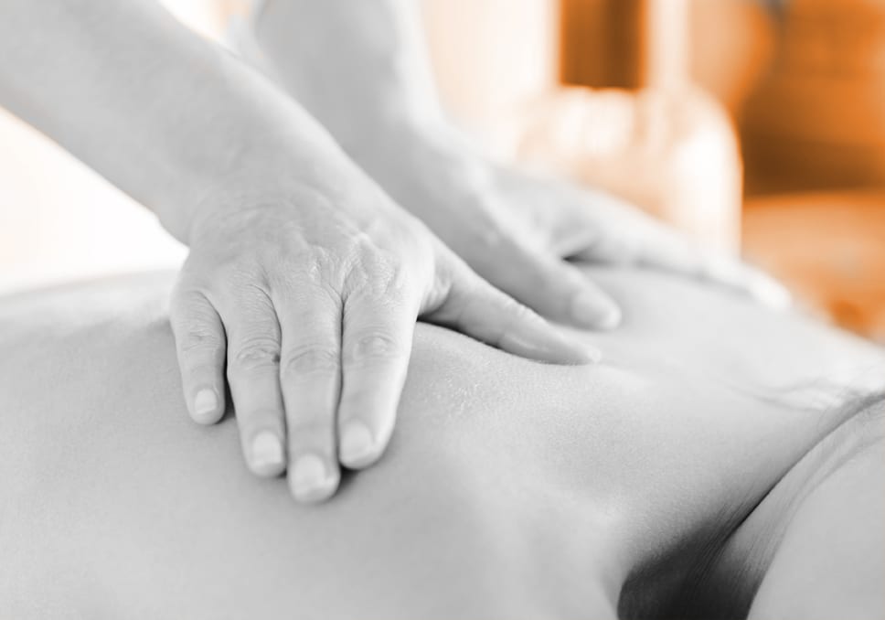 Attractive Woman Having A Massage With Massage Oil In A
