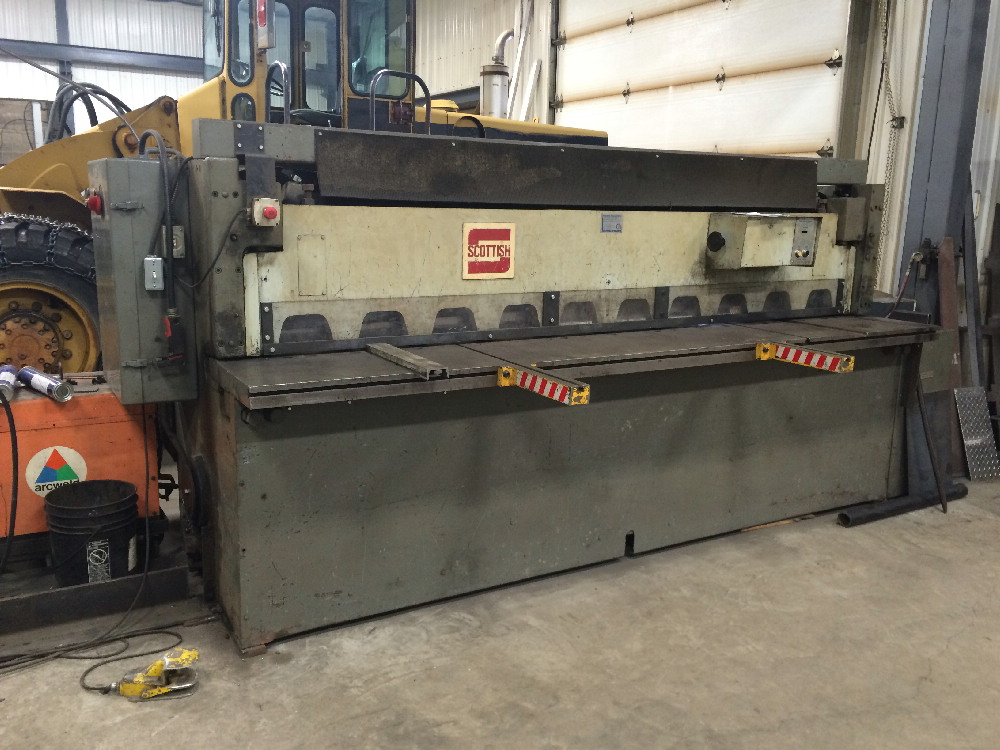 Shear a metal