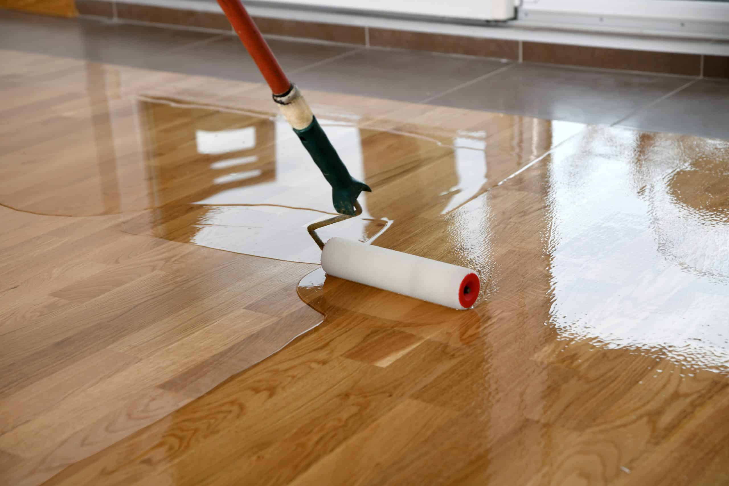 Which hardwood floor finishes color to consider before sanding?