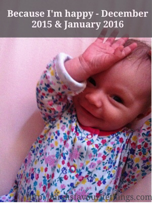 http://mrshsfavouritethings-com.stackstaging.com A cute baby girl smiling, lying on a pink coat sheet and wearing a floral sleep suit with the title "Because I'm happy - December 2015 and January 2016"_Mrs H's favourite things