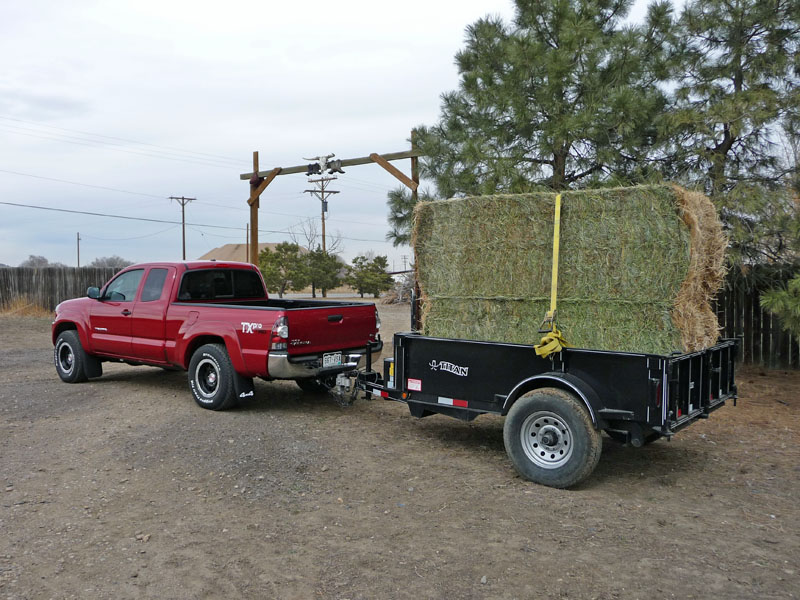 "Toyota Tundra and towing a Cimarron horse trailer and Titan
