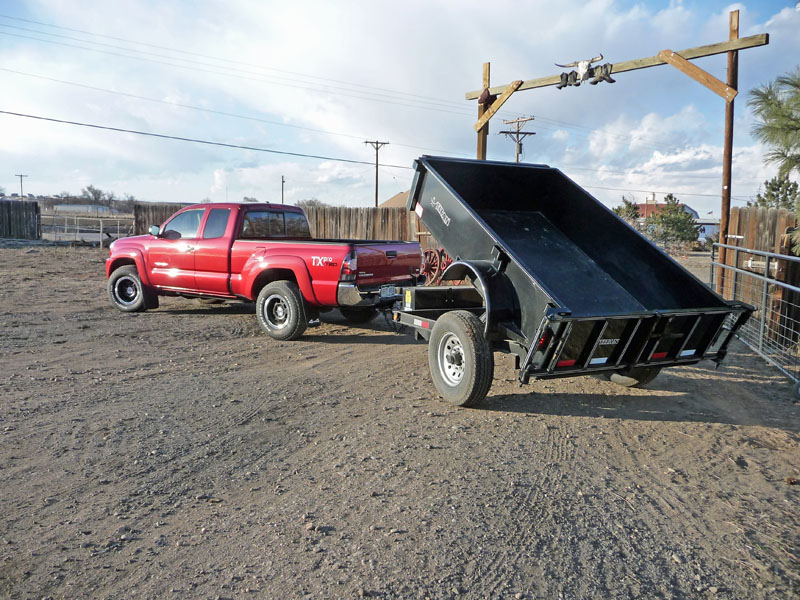 "Toyota Tundra and towing a Cimarron horse trailer and Titan