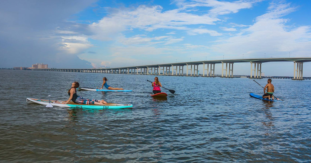 Water You Waiting For? Paddleboarding is a Ton of Fun at Paddles Up in