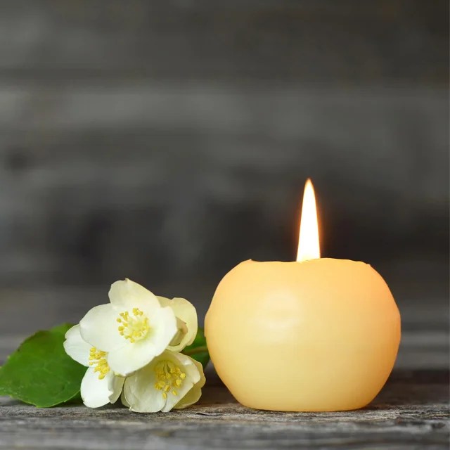 Candle and flower. Condolence card