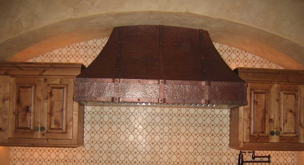 Rustic hand hammered copper range hood the bannack