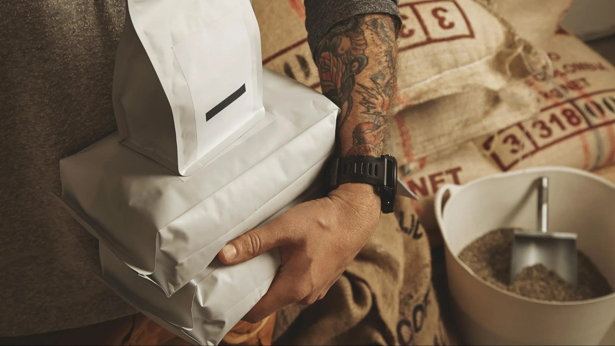 How can specialty coffee roasters reduce their delivery costs?