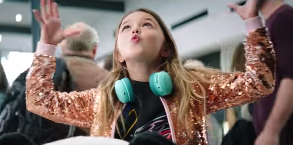 Suncorp's Sunny promotes app while riding through shopping centre on