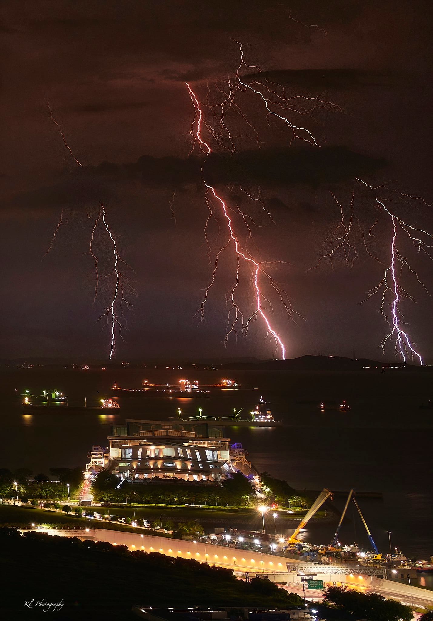 Lightning Rips Through S'pore Night Sky, Striking Shots Rain On Social
