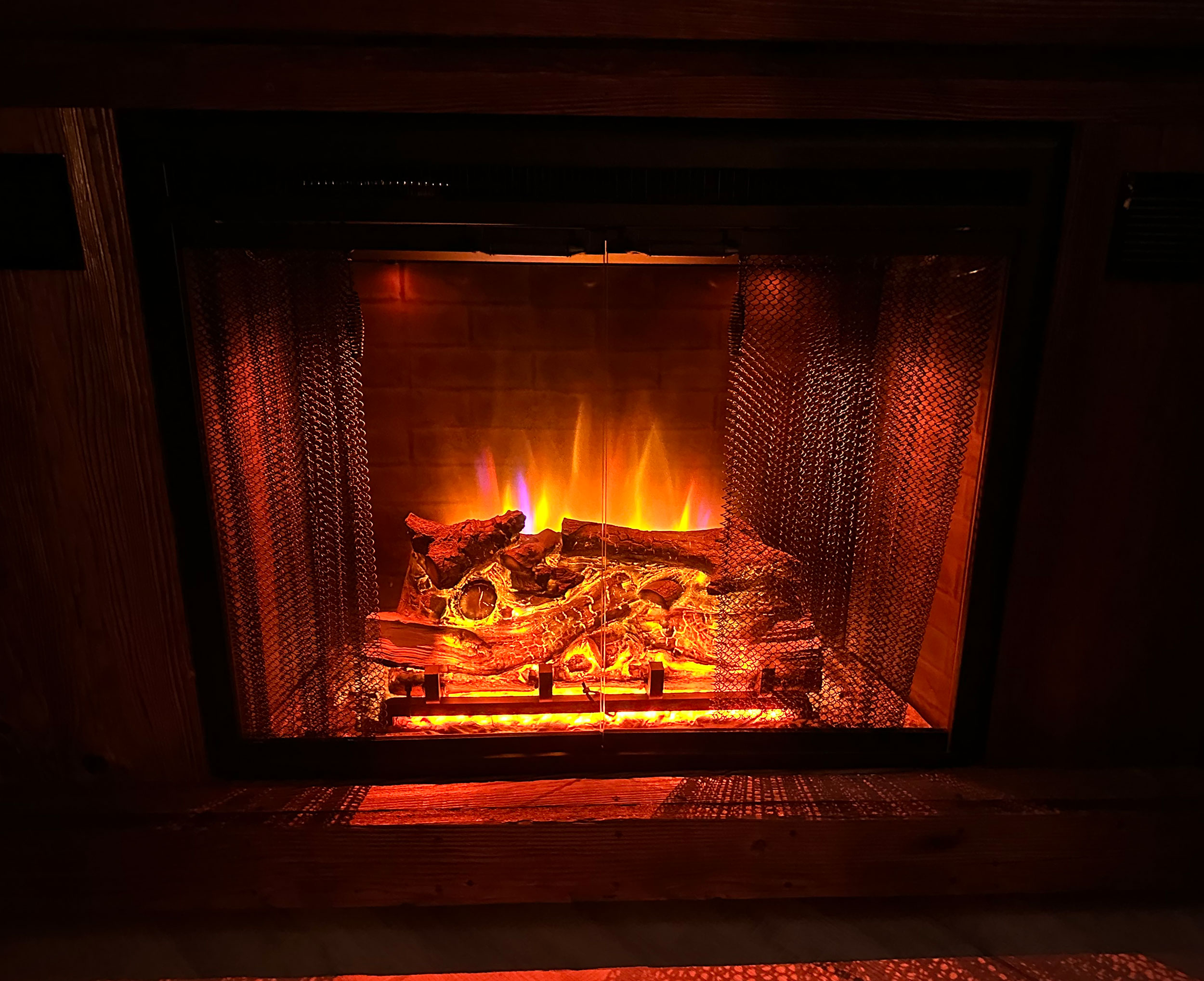 Custom Barnwood Fireplace with Electric Rising TV and Remote